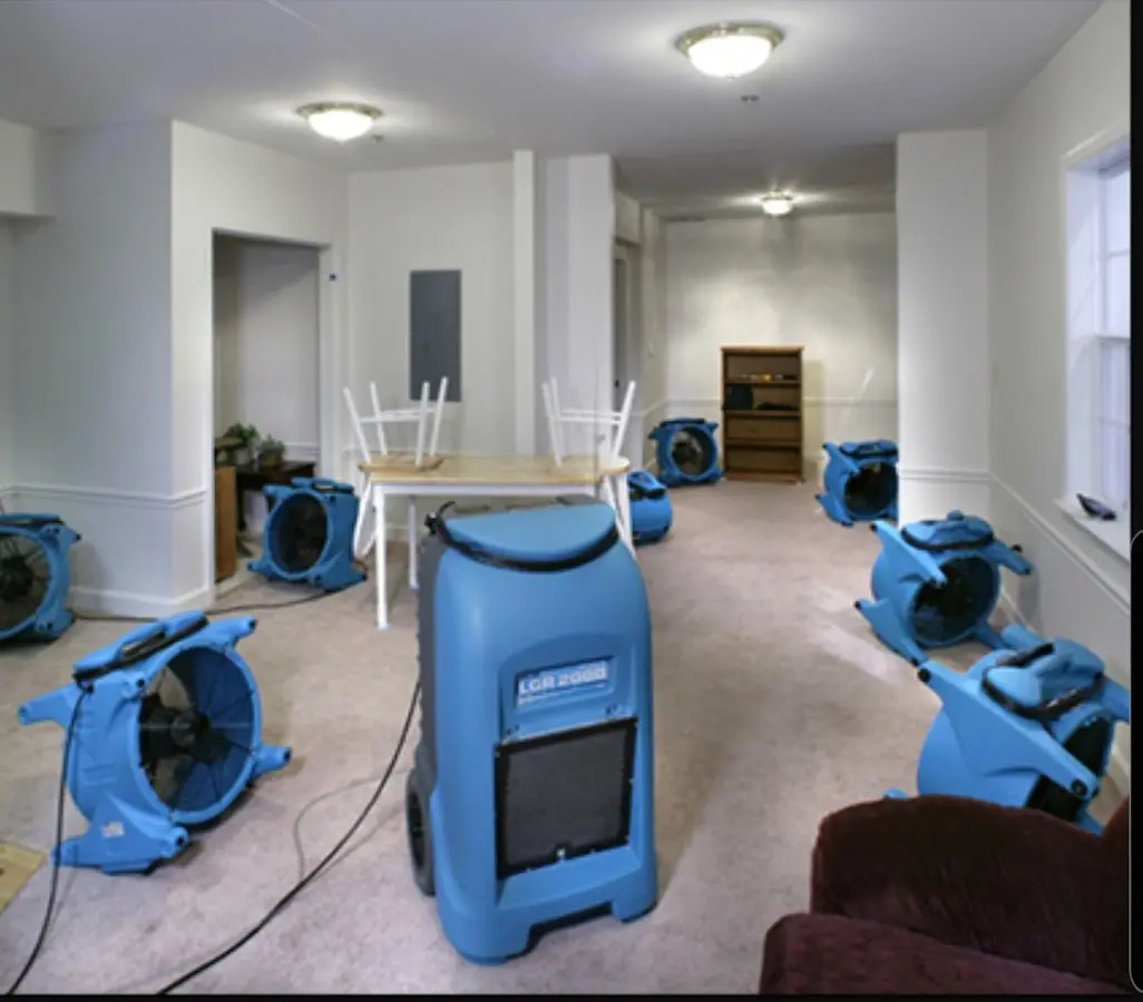 Air movers and dehumidifier setup for Water Damage Restoration in Mexia